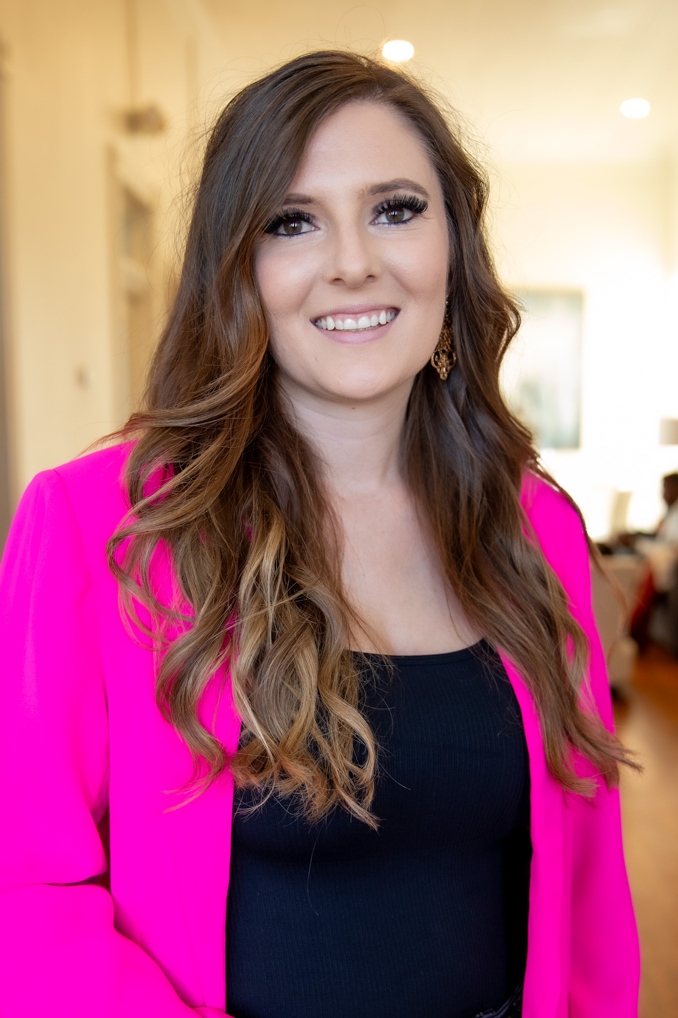 Genna Groff Genna Groff, loan officer at American Liberty Mortgage, smiling in a bright pink blazer, representing her commitment to helping families secure mortgages and achieve homeownership.